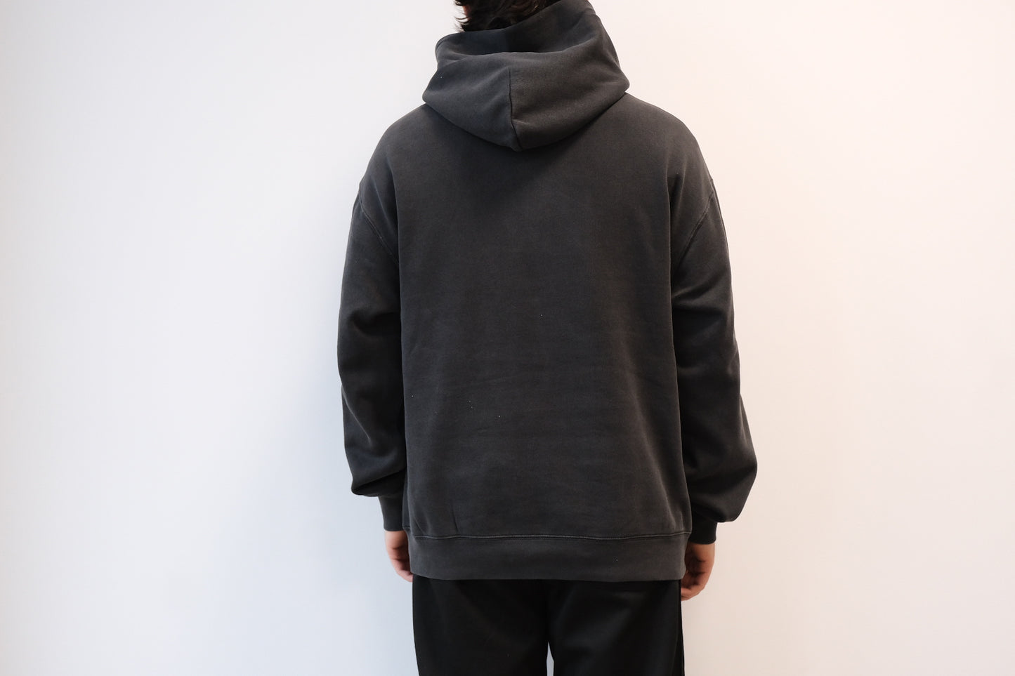 Sunday Club Embroidered Varsity Hoodie in Faded Black.